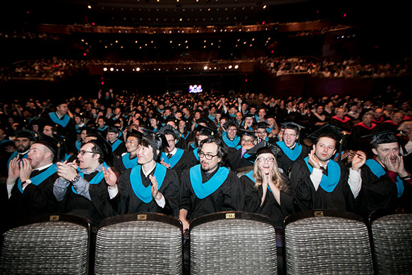 A crowd of SAIT graduates inside the Southern Alberta Jubilee Auditorium.