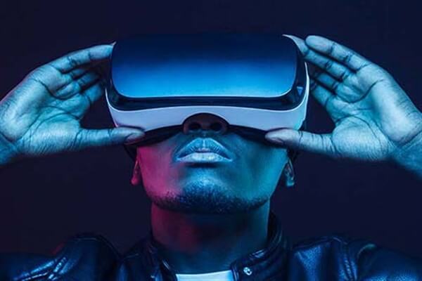 A man wears VR googles.