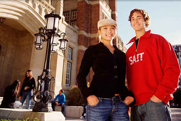 Two student smiling at the camera