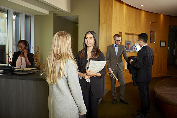 Students meeting in a hotel lobby