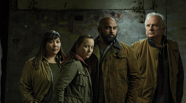 group photo of people in grungy clothes